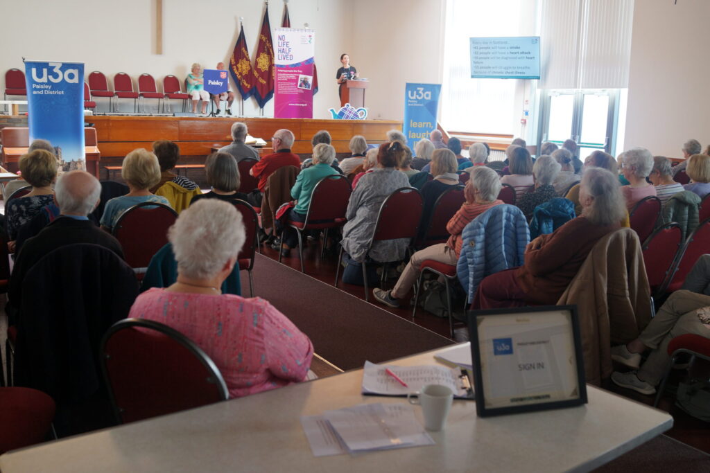Speaker and audience at CHSS talk